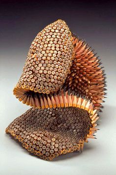 an artistic sculpture made out of pencils