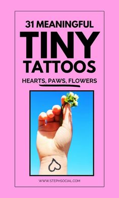 a hand holding a flower with the words tiny tattoos on it