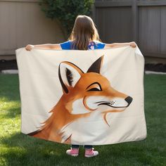 Our "Foxy Smirk" fox blanket is just the perfect companion for any woodland dreamer. This charming fox, with its confident smile, is the perfect blend of cozy warmth and playful style. Crafted in luxurious, soft fleece, it wraps your little one in pure comfort—whether it's nap time, storytime, or a forest adventure of the imagination. The rich earth tones and delightful design create a calming, forest-inspired feel, ideal for any Nursery or Kids' room. You can make it extra special by choosing f Calming Forest, Fox Blanket, Forest Adventure, Playful Style, Baby Arrival, Baby Swaddle Blankets, Baby Swaddle, Customized Blankets, Swaddle Blanket