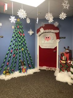 an office decorated for christmas with decorations