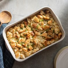 a casserole dish filled with chicken and stuffing