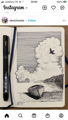 an open notebook with a pen on top of it next to a drawing of a boat