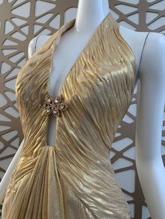 Luxury Gold Evening Dress, Luxury Halter Neck Evening Dress For Gala, Luxury Halter Neck Gala Evening Dress, Luxury Gold Evening Dress For Prom, Luxury Halter Neck Evening Dress For Wedding, Glamorous Gold Gown For Gala, Luxury Gold Floor-length Evening Dress, Luxury Gold Evening Dress With Fitted Bodice, Gold Backless Evening Dress