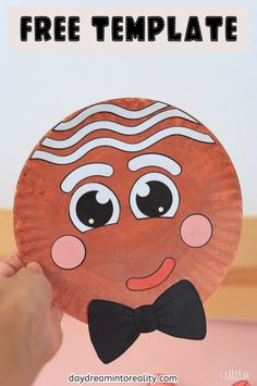 a paper plate with an image of a man's face and bow tie on it