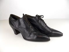 "Pair of women's antique brown leather shoes from the late 1910's to early 1920's. Lace up style with stacked wood heel, and pointed leather cap toe. Heel height 2\". Brand: Walk-Over Walk-Over is the trademark name of the George E. Keith Company, founded in Massachusetts in 1874. The Walk-Over name was first used in 1898. Their women's shoe line was introduced in 1902. Good condition, consistent with age. (These shoes are 100 years old.) They are still wearable for a photo shoot, theater produc 1910 Shoes, 1860s Shoes, 1920 Style, Historical Shoes, Drawing Challenges, Brown Leather Shoes, Black Dress Shoes, Old Shoes, Wood Heel