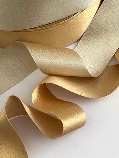 gold satin ribbon on white background