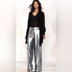 Nasty Gal. Silver Is On Trend And Having A Renaissance Moment. Metallic Silverwide Legged Pants. Stand Out In These Chic And Lovely Pants That Feature A Shimmer Finish In Silver, High-Waisted, Wide-Leg Silhouette And Hidden Zip Fly Closure. Perfect For Night On The Town, Day Or Night Wear Or Special Occasion Style. Lightweight, Relaxed Fit. Excellent, Unworn Condition. Make An Offer. Thank You So Much. Details: L: 41.5 Inches Waist To Bottom Waistline: 26 Inches 100% Polyester Imported Wear What Silver Trousers, Silver Pants, Liquid Courage, High Waisted Wide Leg Pants, Liquid Silver, Party Pants, Disco Outfit, Pants Wide Leg, Wide Leg Trousers