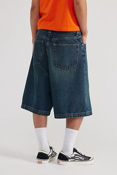 Oversized BDG baggy jorts in premium BDG denim. Longline denim shorts with a relaxed fit and zip fly. Urban Outfitters exclusive. Features BDG Astro baggy jorts Rigid BDG denim Loose longline fit 5-pocket; zip fly UO exclusive Content + Care 100% Cotton Machine wash Imported Size + Fit Model in Dark Green 6'1.5" and wearing size 32 Measurements taken from size 32 Rise: 14" Inseam: 11.5" Leg opening: 12.5" | BDG Astro Baggy Denim Jort in Dark Green, Men's at Urban Outfitters Baggy Cargo Shorts Outfit Men, Oversized Shorts Men, Baggy Shorts Outfit Men, Mean Girls Plastics, Baggy Shorts Outfit, Jorts Men, Baggy Jeans Men, Jorts Baggy, Urban Outfitters Men