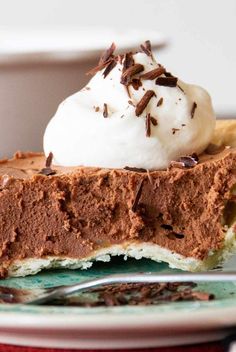 a slice of chocolate pie with whipped cream on top