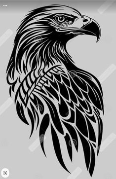 an eagle's head in black and white on a gray background