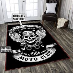 a black area rug with an image of a skull on it and the words motor club