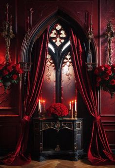 red roses and candles in front of a gothic - styled window with drapes on it