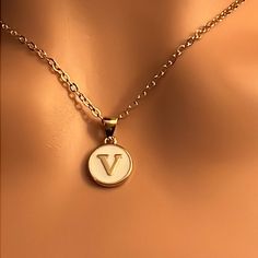 V Necklace Made With Gold Plated Chain. *16”-18”W/Extender Gold Plated Chain *16mm Pendant *Double Sided Pendant Everyday White Clavicle Chain Charm Necklace, White Clavicle Chain Necklace With Initial Pendant, White Initial Pendant Necklace With Clavicle Chain, White Initial Pendant Clavicle Necklace, White Clavicle Chain Necklace With Round Pendant, Everyday White Chain Necklace With Round Pendant, Trendy White Round Necklace, V Letter, V Necklace