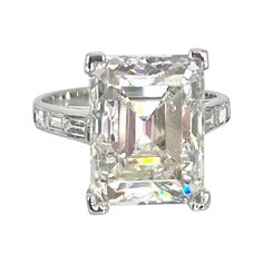 an emerald cut diamond ring with baguetts