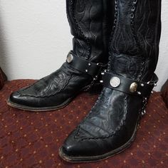 * Customize your look with adjustable Buffalo Nickel Boot Straps in black leather * Authentic buffalo nickel * Chain with clasp keeps strap from turning * Price is per individual strap Vampire Fashion, Steampunk Boots, Masc Fashion, Mens Motorcycle Boots, Boot Chains, Custom Boots, Buffalo Nickel, Boots Cowboy, Boot Straps