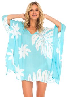 Having a stylish beach cover up is a must! The beautifully printed tunic beach cover up creates a vibrant look. Easy to pull on and easy to pack. Making clothes for the traveling woman. Boho design Lightweight beach dress Semi-Sheer Hand wash in cold water, hang to dry Floral Beach Dresses, Traveling Woman, Floral Beach Dress, Beach Cover Up Dress, Poncho Dress, Swimsuit Cover Up Dress, Dress Kaftan, Beach Coverup Dress, Cover Beachwear