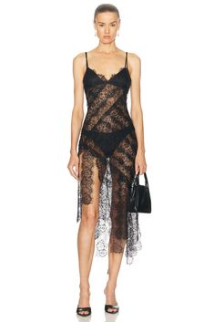 Find RETROFETE Sabina Lace Dress on Editorialist. retrofete Sabina Lace Dress in Black Self 1: 100% nylon Self 2: 95% viscose 5% spandex. Made in China. Dry clean only. Unlined. Pull-on styling. Fringe styling at hem. Garment is intentionally sheer, undergarments will show through. Please note undergarment not included. Lace fabric. RTFF-WD553. PF24-9569. About the designer: Inspired by the decadence of the disco-era, retrofete channels the after hours of 1960s and ‘70s glam to dress the ultimate party girl. Co-founders and designers Ohad Seroya and Aviad Klin brilliantly masters the art of sophisticated glamour using signature shimmery lit sequin fabrics and antique lace in seductively draped silhouettes for a coveted collection of elevated party-ready attire. Fringe Styling, Styling Fringe, 70s Glam, Xmas 2024, Fringe Fashion, Disco Era, Party Girl, Lace Dress Black, Antique Lace