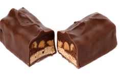 two pieces of chocolate with peanut butter inside