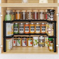 an organized spice rack with spices and seasonings