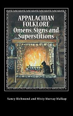 an old book cover with a cat sitting in front of a fire place and the words appalachian folklore, omenss, signs and superstiitions