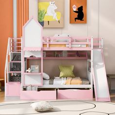 there is a pink bunk bed with a cat on the top and bottom shelf above it