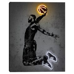 a basketball player jumping up in the air with a neon light above his head on a gray background