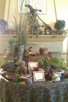 a table topped with lots of plants and pictures