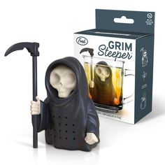 a figurine that is next to a box with the grim steeper logo on it