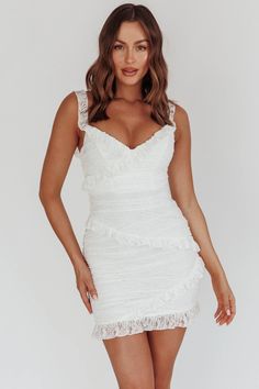 Lace mini dressFully linedFrill trim detailOff-shoulder styleInvisible zip at backYou'll be livin' la vida loca in this super cute dress. We are obsessed with the lace overlay and adorable frill trim. Perfect for a bachelorette or an extra special birthday party. Team it with white, strappy heels and a clutch for a white-hot look.CAREHand Wash Cold. Do Not Iron.MATERIALSPANDEX/POLYESTER Mini Dresses Party, White Strappy Heels, Selfie Leslie, Yellow Bridesmaids, Red Bridesmaids, Mini Dress White, Green Bridesmaid, Off Shoulder Fashion, Blue Bridesmaids