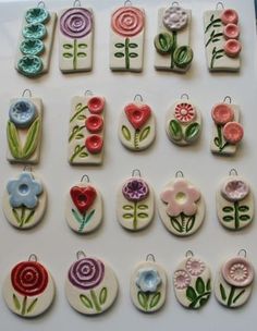 several different types of buttons with flowers on them