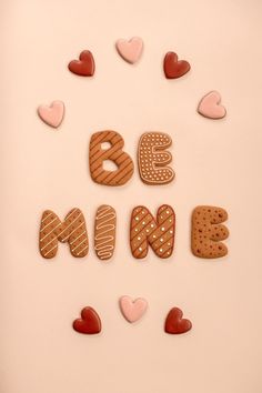 the word be mine spelled with cookies and hearts