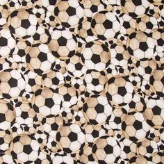 a black and white soccer ball pattern on a fabric background that looks like it has been made out of yarn