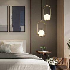 a modern bedroom with two hanging lights above the bed and side table in front of it