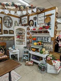 a room filled with lots of different types of furniture and decor on display in baskets