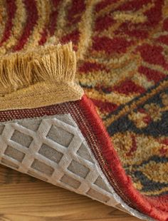 a close up view of a rug on the floor