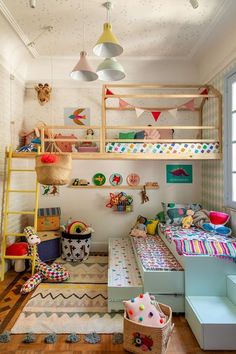 a child's bedroom with bunk beds and toys