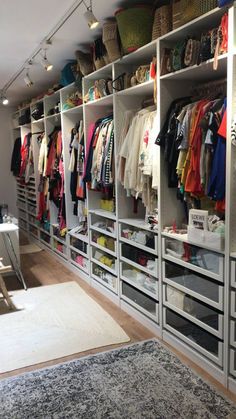 the closet is full of clothes and other items