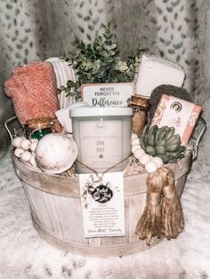 a basket filled with items sitting on top of a bed