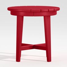 a small red table with four legs and a round top on an isolated white background