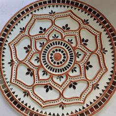 a decorative plate with an intricate design on it