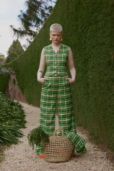 In their homage to Cher Horowitz's iconic suit sets, House of Campbell drew inspiration from Scotland's verdant landscapes for their creation, the Verdant vest. Featuring a vibrant green check pattern, the vest captures nature's artistry with a blend of charm and comfort, including an adjustable D-ring strap at the back for wearer convenience. This playful nod to 90s fashion, when paired with their kilt-inspired mini skirt, allows wearers to step into their own Clueless-inspired dreams with effo Green Nature Outfit, Matching Vest And Pants Outfit, Green Vest Outfit, Outfit Themes, Cher Horowitz, Tailoring Techniques, Corporate Attire, Check Skirt, Ultra Wide