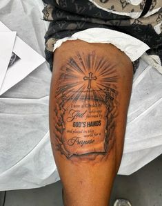 a person with a tattoo on their leg and the words, god's hands