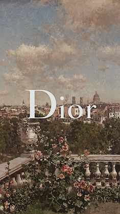 the words dior are in front of an image of flowers and trees with buildings in the background