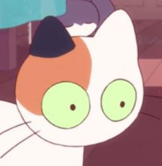 a cartoon cat with green eyes and an orange nose is staring at something in the distance