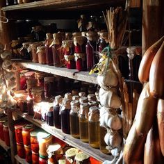 an assortment of spices and condiments on shelves