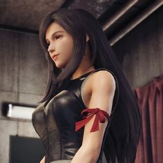 a woman with long black hair wearing a leather dress and red ribbon around her arm