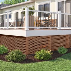 a house with a deck and privacy fence