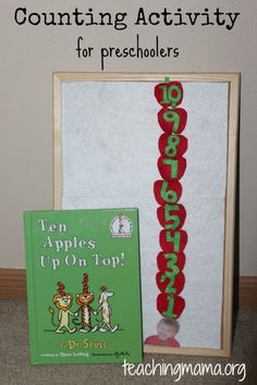 a book and an apple on top with the title counting activity for preschoolers ten apples up on top