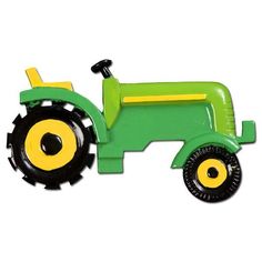 a green toy tractor sitting on top of a white surface