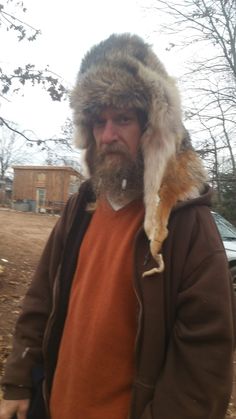 My husband looks amazing in this black powder rendezvous Coyote trappers cap... or hunting trip... This lush winter fur Coyote pelt makes a great trappers cap for rendezvous season & any mountain man camp your attending... great for your next black powder event... & I will create an original just for you... Hubby wears his year round...Great for chilly weather & winter wear too... This unique Real Coyote Fur Cap will be custom to fit most size adult heads with room to adjust... or child's head...if you let me know who I'm creating it for... It's light but very warm... Paws to cover your ears & the body to outline the face... only variation is having a Coyote face or not... Please look thru all the pics & see which variation works for you... Not all Coyote pelts are the same... Not all face Fur Trapper, Coyote Fur, Husband Material, Hunting Trip, Trapper Hats, Mountain Man, Chilly Weather, Fur Hood, Winter Wear